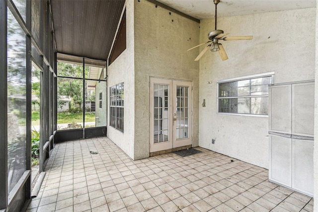 8755 Marigold Dr, New Port Richey, FL 34654 - unfurnished sunroom with ceiling fan and french doors