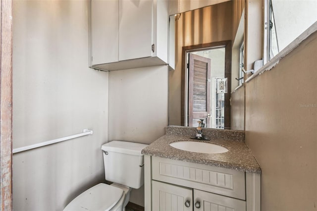 8755 Marigold Dr, New Port Richey, FL 34654 - bathroom featuring toilet and vanity