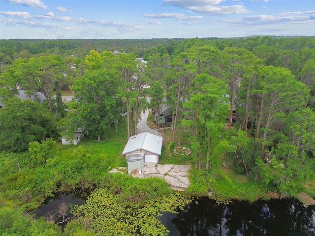 8755 Marigold Dr, New Port Richey, FL 34654 - view from above of property with a heavily wooded area and a large body of water