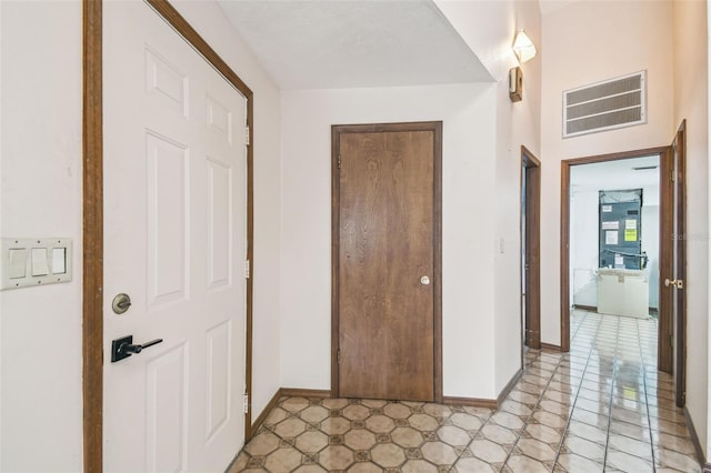 8755 Marigold Dr, New Port Richey, FL 34654 - entrance foyer featuring baseboards