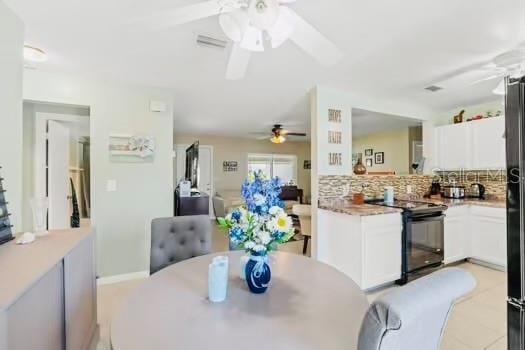 6656 Pinecrest Ln N, Pinellas Park, FL 33781 - dining room with ceiling fan
