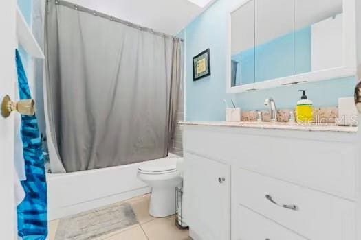 6656 Pinecrest Ln N, Pinellas Park, FL 33781 - bathroom with vanity, shower / bath combo, toilet, and tile patterned floors