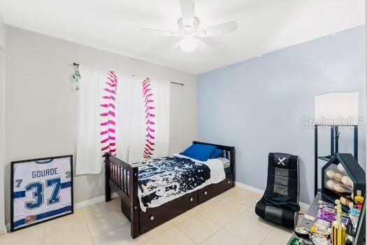 6656 Pinecrest Ln N, Pinellas Park, FL 33781 - bedroom featuring tile patterned flooring, baseboards, and ceiling fan
