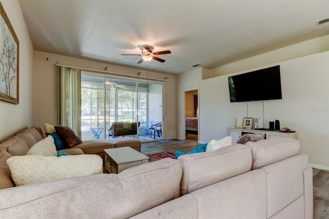 14466 Tamarind Loop, Spring Hill, FL 34609 - living area with wood finished floors and ceiling fan