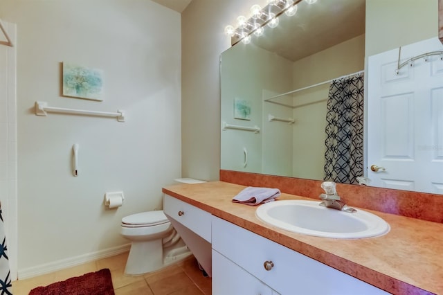 14466 Tamarind Loop, Spring Hill, FL 34609 - bathroom featuring vanity, tile patterned floors, toilet, a shower with shower curtain, and baseboards