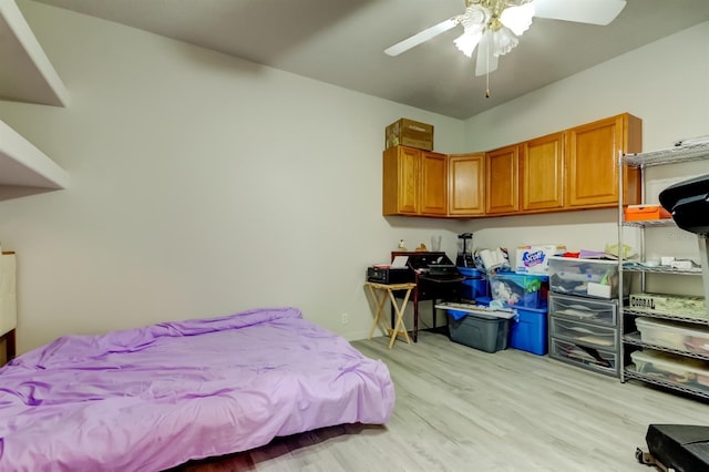 14466 Tamarind Loop, Spring Hill, FL 34609 - bedroom featuring light wood-type flooring and a ceiling fan