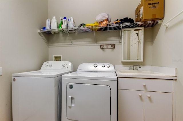14466 Tamarind Loop, Spring Hill, FL 34609 - laundry area featuring washer and dryer and a sink