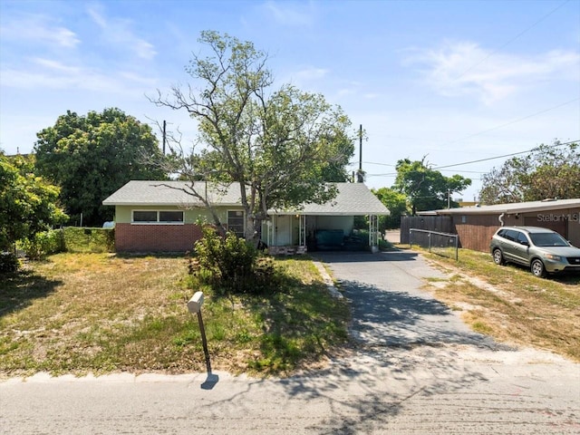 5121 Hemlock Dr, New Port Richey, FL 34652 - view of front of house with driveway