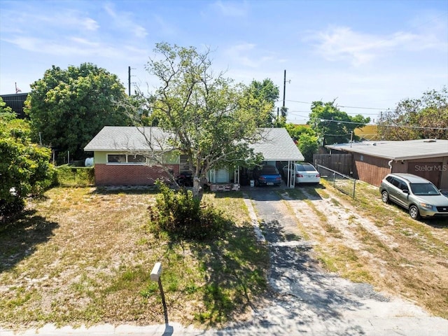 5121 Hemlock Dr, New Port Richey, FL 34652 - view of front of property with dirt driveway