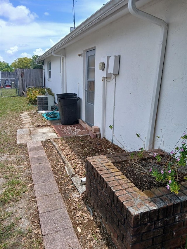 9516 Glen Moor Ln, Port Richey, FL 34668 - view of yard featuring central AC