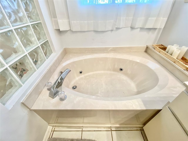 9200 Turnberry Ct, New Port Richey, FL 34655 - full bathroom featuring a tub with jets and tile patterned flooring