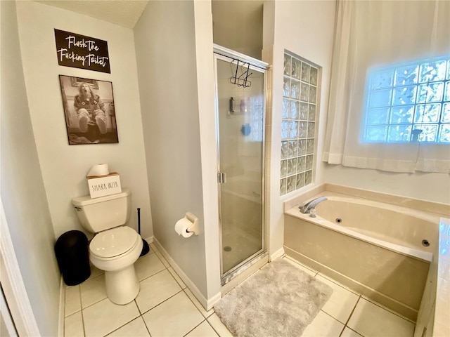 9200 Turnberry Ct, New Port Richey, FL 34655 - full bathroom featuring tile patterned flooring, a tub with jets, a shower stall, and toilet