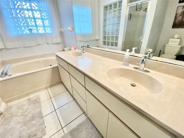 9200 Turnberry Ct, New Port Richey, FL 34655 - full bath with toilet, a bath, double vanity, tile patterned floors, and a stall shower