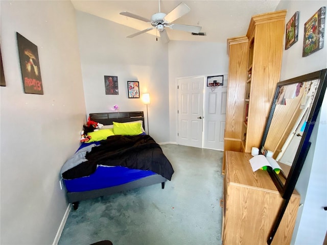 9200 Turnberry Ct, New Port Richey, FL 34655 - bedroom with baseboards, vaulted ceiling, and a ceiling fan