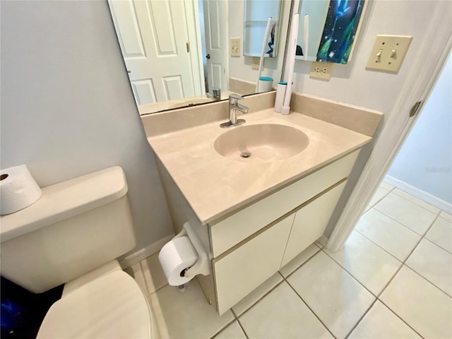 9200 Turnberry Ct, New Port Richey, FL 34655 - bathroom featuring toilet, vanity, and tile patterned floors