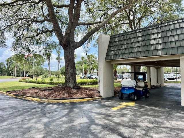 9200 Turnberry Ct, New Port Richey, FL 34655 - view of vehicle parking with a carport
