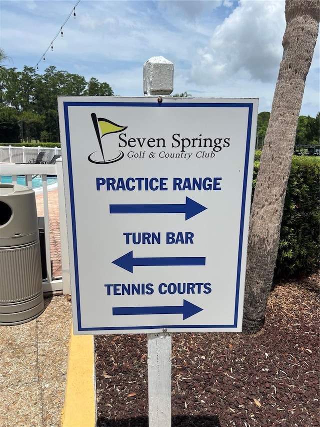 9200 Turnberry Ct, New Port Richey, FL 34655 - exterior view of central air condition unit and a pool