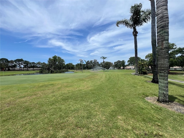9200 Turnberry Ct, New Port Richey, FL 34655 - view of property's community featuring a water view, golf course view, and a yard