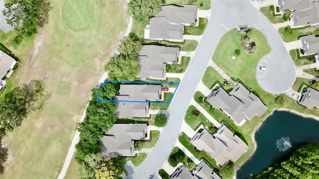 9200 Turnberry Ct, New Port Richey, FL 34655 - aerial view of residential area featuring a nearby body of water and property parcel outlined