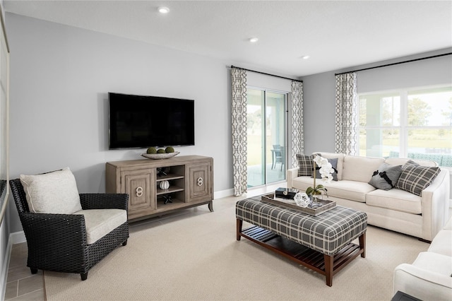 1705 W Palms Dr, Port Charlotte, FL 33953 - living area featuring healthy amount of natural light, recessed lighting, and baseboards