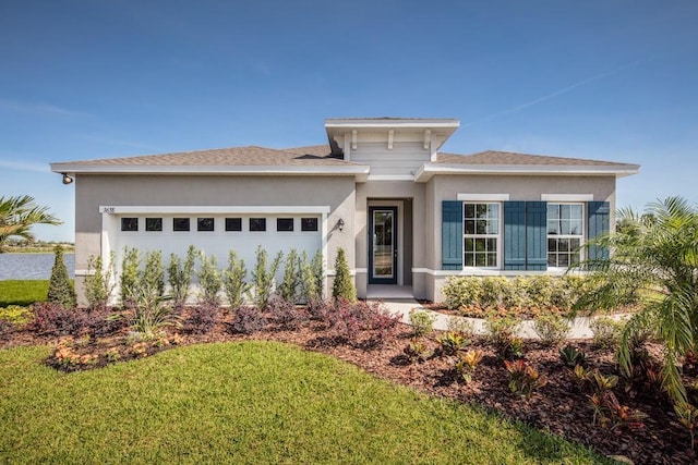 1729 W Palms Dr, Port Charlotte, FL 33953 - prairie-style house featuring an attached garage, stucco siding, and a front lawn
