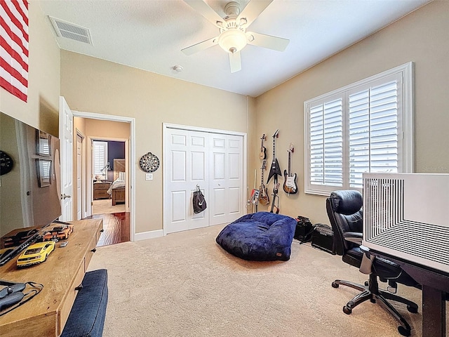 13248 Linzia Ln, Spring Hill, FL 34609 - home office featuring carpet flooring, a ceiling fan, and baseboards
