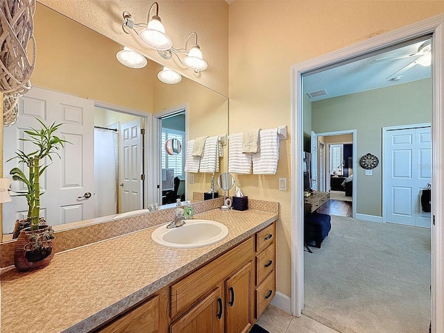 13248 Linzia Ln, Spring Hill, FL 34609 - ensuite bathroom with vanity and baseboards