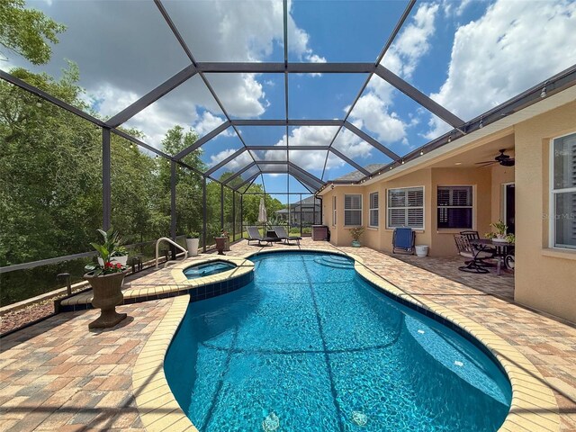 13248 Linzia Ln, Spring Hill, FL 34609 - view of pool with a patio, a pool with connected hot tub, and a lanai