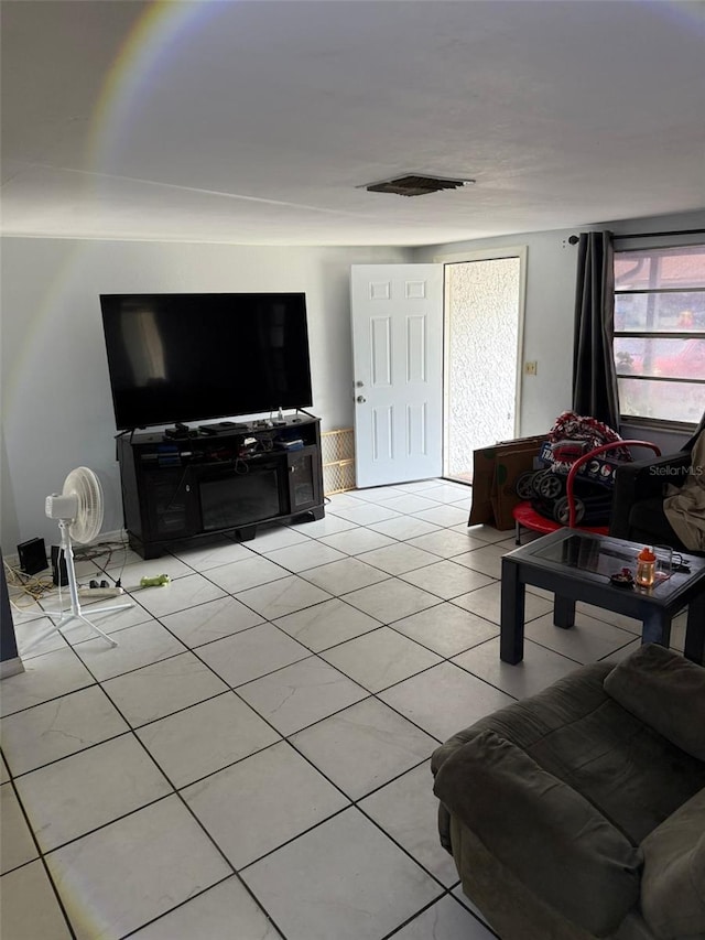11726 Oceanside Dr, Port Richey, FL 34668 - living area with light tile patterned floors