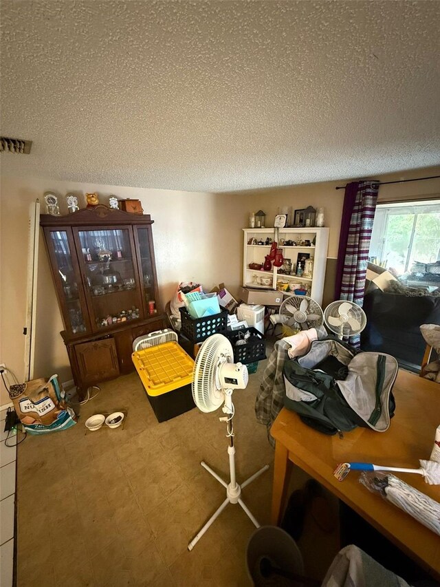 11726 Oceanside Dr, Port Richey, FL 34668 - misc room featuring a textured ceiling