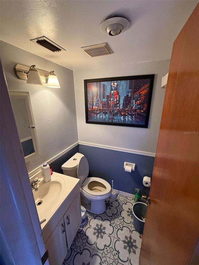 11726 Oceanside Dr, Port Richey, FL 34668 - bathroom with toilet and vanity