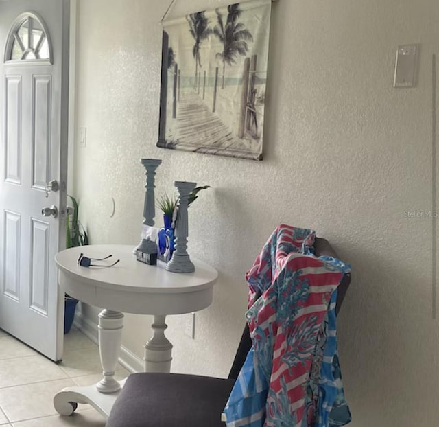 6603 Adams St, New Port Richey, FL 34652 - entrance foyer with tile patterned floors and a textured wall