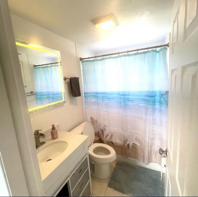 6603 Adams St, New Port Richey, FL 34652 - bathroom featuring vanity, toilet, and shower / bath combo with shower curtain