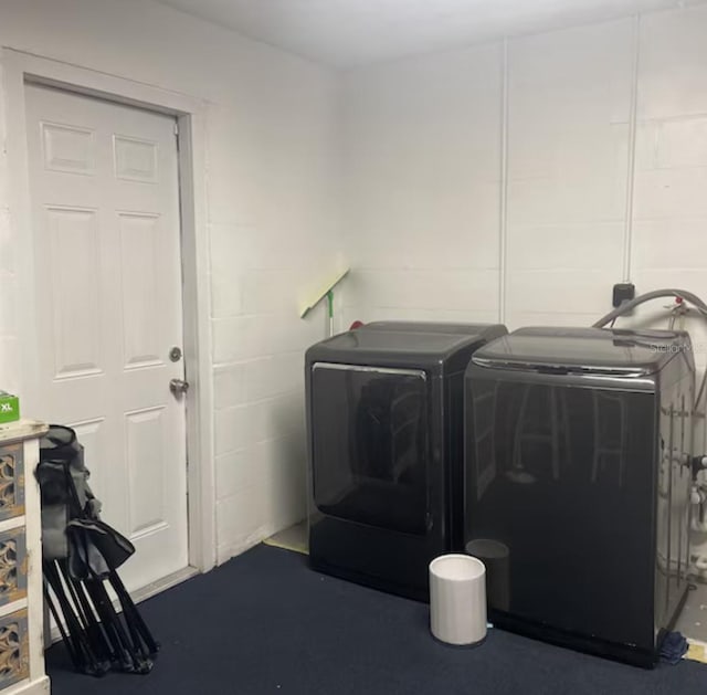 6603 Adams St, New Port Richey, FL 34652 - laundry area with separate washer and dryer