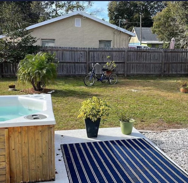 6603 Adams St, New Port Richey, FL 34652 - view of yard with a hot tub