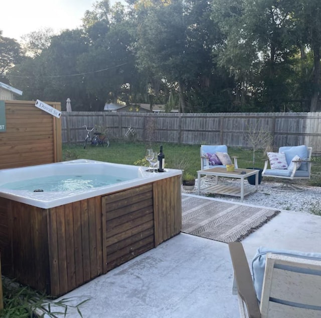 6603 Adams St, New Port Richey, FL 34652 - fenced backyard featuring a hot tub
