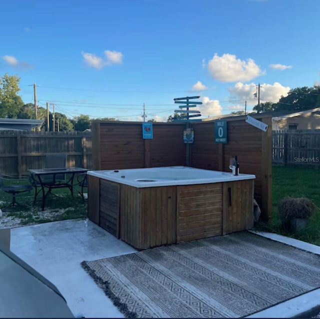 6603 Adams St, New Port Richey, FL 34652 - view of patio with a hot tub