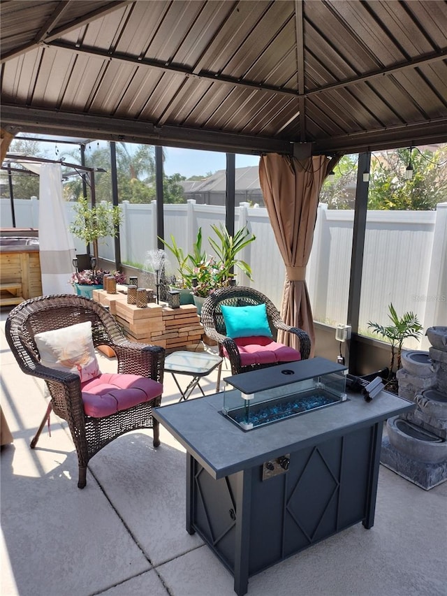 9967 Patrician Dr, New Port Richey, FL 34655 - fenced backyard featuring an outdoor fire pit and a patio area