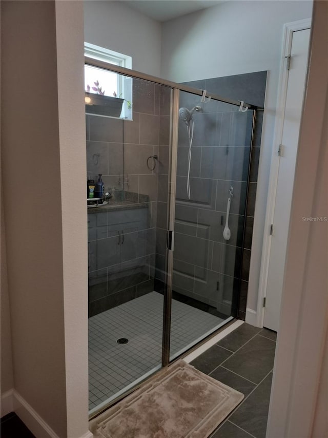 9967 Patrician Dr, New Port Richey, FL 34655 - full bathroom with a stall shower and tile patterned floors