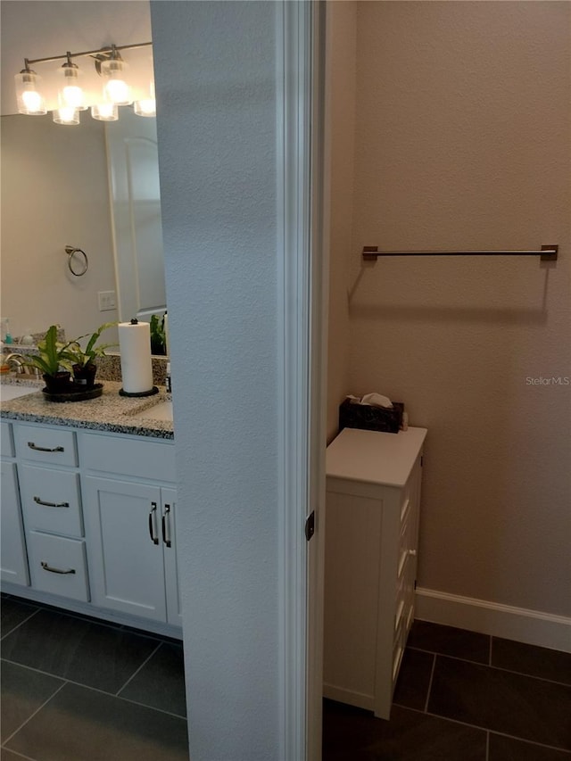 9967 Patrician Dr, New Port Richey, FL 34655 - bathroom featuring tile patterned flooring and vanity