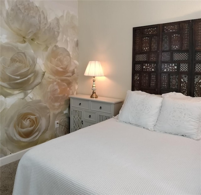 9967 Patrician Dr, New Port Richey, FL 34655 - bedroom with carpet flooring and baseboards