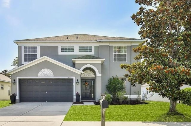 4094 Braemere Dr, Spring Hill, FL 34609 - view of front of home featuring driveway, stucco siding, and a front lawn