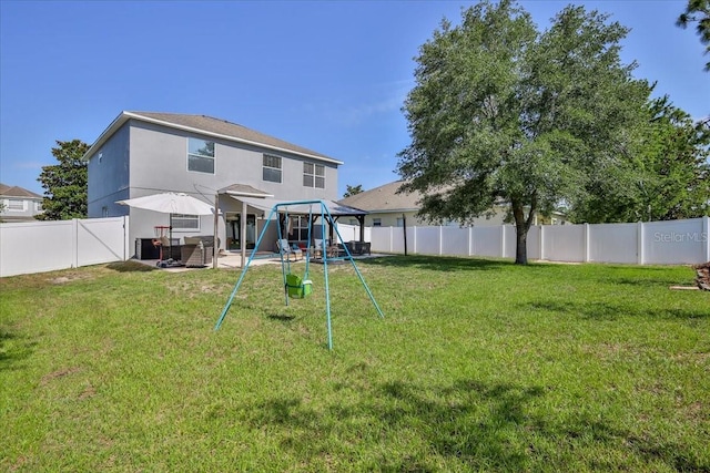 4094 Braemere Dr, Spring Hill, FL 34609 - rear view of property featuring a playground and a patio