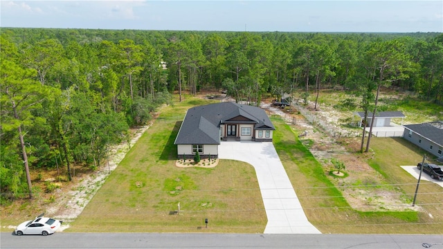 10380 Yellow Hammer Rd, Weeki Wachee, FL 34614 - view of subject property with a heavily wooded area