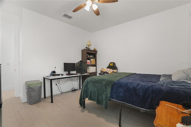 10380 Yellow Hammer Rd, Weeki Wachee, FL 34614 - bedroom featuring wood finished floors and ceiling fan