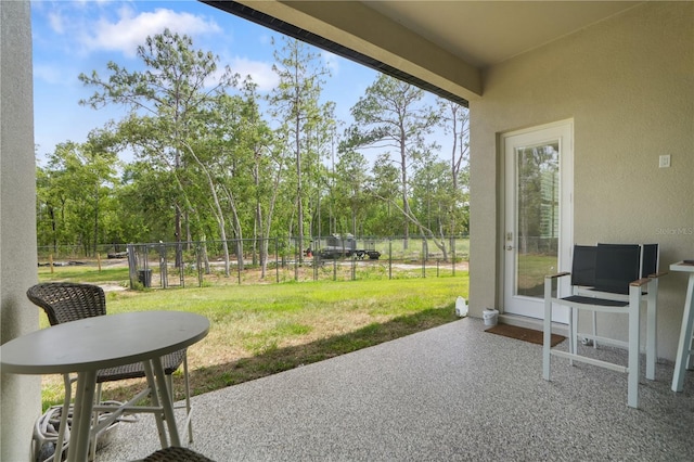 10380 Yellow Hammer Rd, Weeki Wachee, FL 34614 - view of patio / terrace with view of wooded area