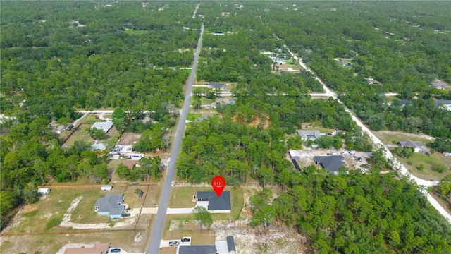 10380 Yellow Hammer Rd, Weeki Wachee, FL 34614 - aerial overview of property's location with a heavily wooded area