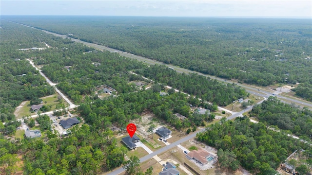 10380 Yellow Hammer Rd, Weeki Wachee, FL 34614 - view of property location with a heavily wooded area