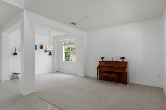 4215 Maplehurst Way, Spring Hill, FL 34609 - sitting room featuring carpet, a chandelier, and baseboards