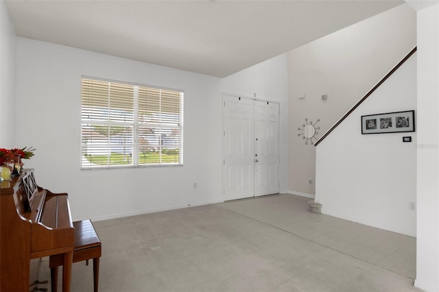 4215 Maplehurst Way, Spring Hill, FL 34609 - carpeted foyer featuring baseboards